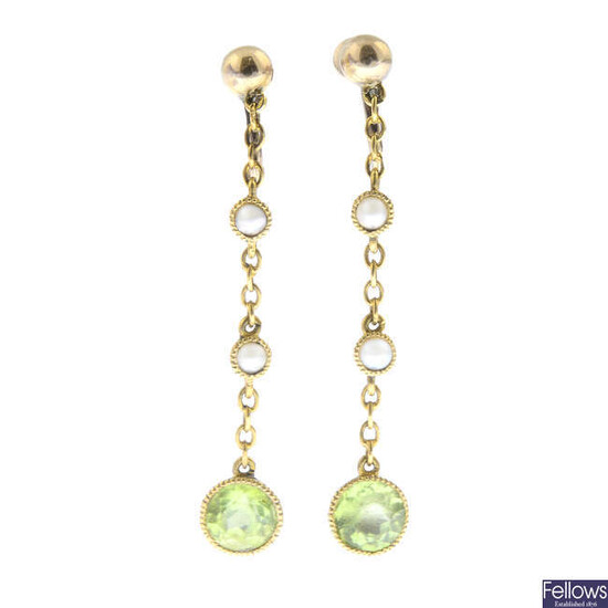 A pair of peridot and seed pearl drop earrings.