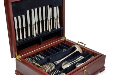 A part-canteen of silver flatware, retailed by Harrods, Sheffield, 1990, in fitted mahogany box (not signed), comprising: 8 dessert forks; 8 table forks; 8 dessert spoons; 8 soup spoons; 8 dessert knives; 8 table knives; 8 teaspoons; 4 serving...