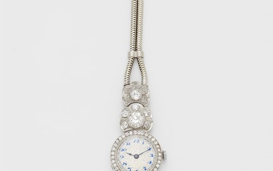 A platinum and diamond Art Déco ladies wristwatch with 18k gold tubogaz bracelet.