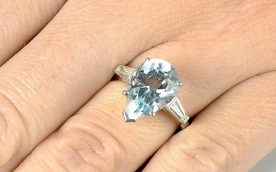 A platinum aquamarine single-stone ring, with tapered