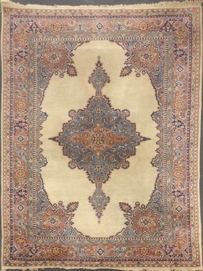 A sand ground Persian style rug with central spiked medallion, 357 x 250cm