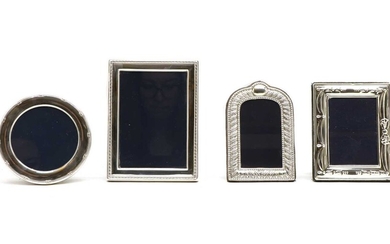A set of four silver-mounted photo frames