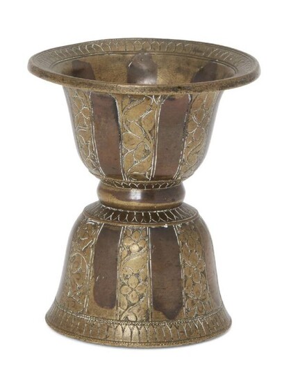 A small copper inlaid brass spittoon, South...