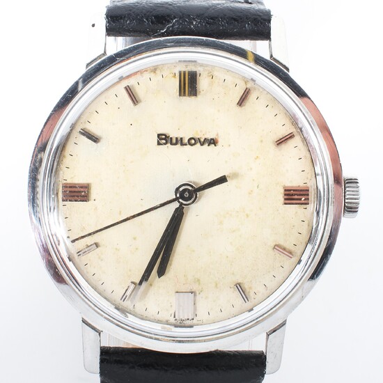 A vintage gents Bulova wristwatch, the dial with batons denoting hours, on a later leather strap