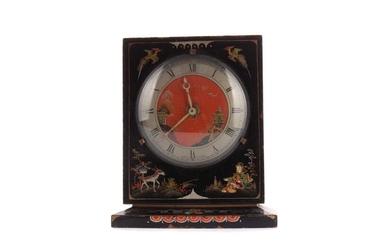 AN EARLY 20TH CENTURY JAPPANED MANTEL CLOCK