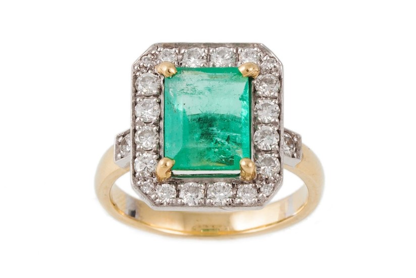 AN EMERALD AND DIAMOND CLUSTER RING, the central emerald sur...
