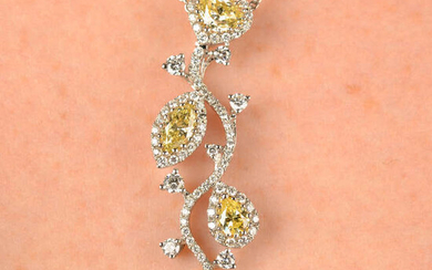 An 18ct gold brilliant-cut diamond and vari-shape 'yellow' diamond stylised floral pendant, with 18ct gold chain.