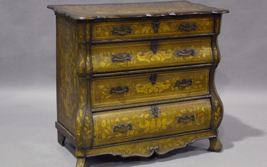 An 18th century Dutch oak and floral marquetry four-drawer commode, the shaped top above projecting