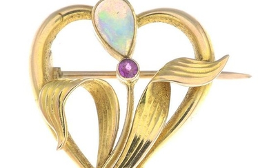 An Art Nouveau 15ct gold opal and ruby brooch.Stamped