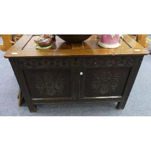 An antique oak Coffer, 17th century and later, the hinged tw...