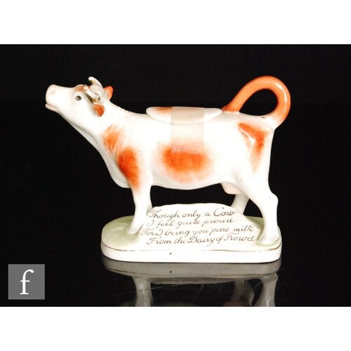 An early 20th Century Royal Dux cow creamer and cover, the c...