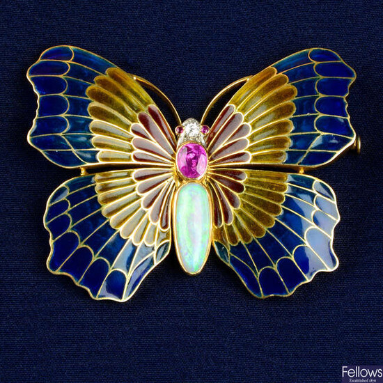 An early 20th century 18ct gold plique-à-jour enamel, opal, ruby and diamond butterfly brooch.