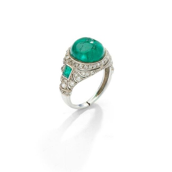 An early 20th century emerald and diamond ring
