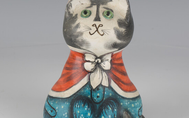 An early Joan and David De Bethel Rye papier-mâché cat, dated 1966, seated wearing a blue