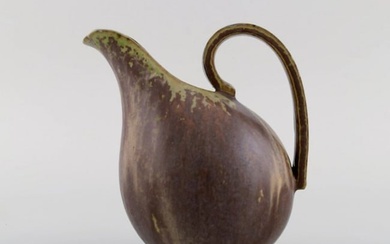 Arne Bang. Jug with handle in glazed ceramics. Model number 161. Beautiful glaze in green and brown