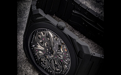 BVLGARI. AN EXTRA THIN BLACK CERAMIC SKELETONISED WRISTWATCH WITH POWER RESERVE AND BRACELET OCTO FINISSIMO MODEL, REF. 103126, CIRCA 2022