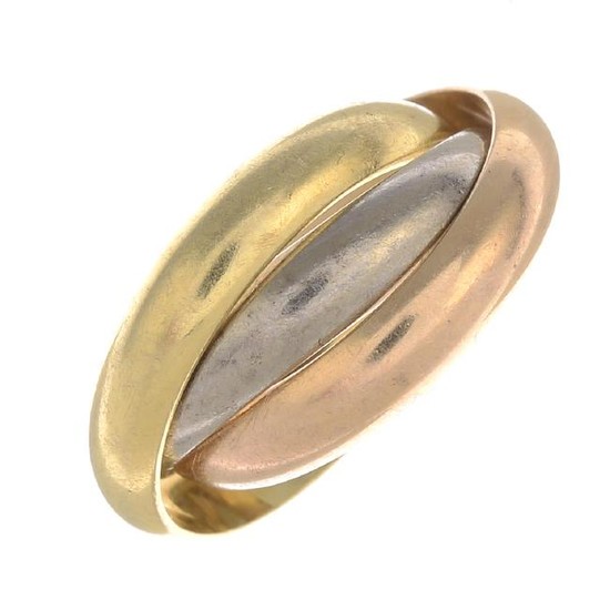 CARTIER - a 'Trinity' ring. Comprising three tri-colour