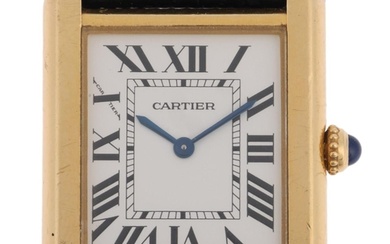 CARTIER - a mid-size 18ct gold and stainless steel Tank Solo...