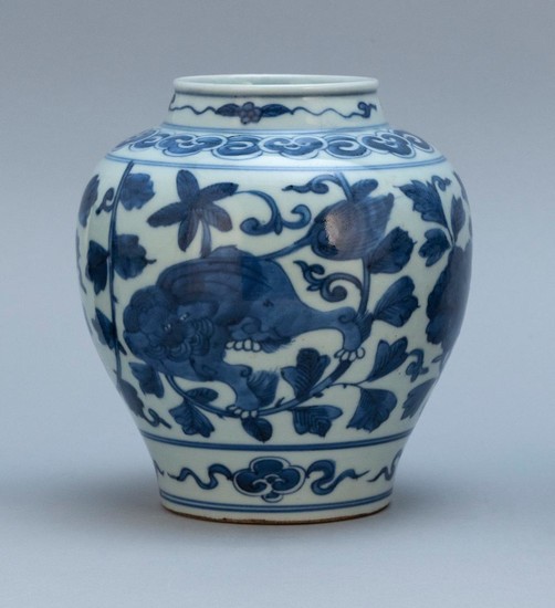 CHINESE BLUE AND WHITE PORCELAIN VASE Ovoid, with peony decoration. Height 7".