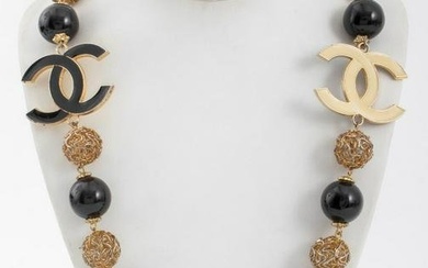 Chanel necklace with gold-tone metal and black enamel beads, two signature double-C logo emblems