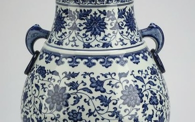 Chinese blue and white lotus scroll hu vase
