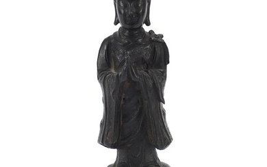 Chinese patinated bronze figure of a standing monk, 24.5cm h...