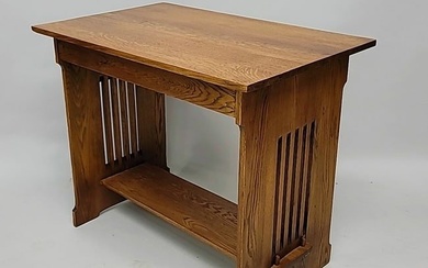 Circa 1915 Arts & Crafts Oak Side table with interesting design on the ends.- w 36" d 23" h 30".