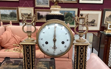 Early 19th century French Louis XVI-style marble and ormolu mantel clock