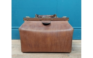 Early 20th C. leather Gladstone bag with metal mounts stampe...