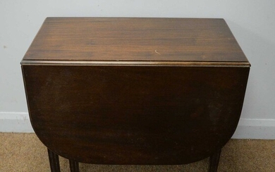 Early 20th C mahogany drop leaf dining table.