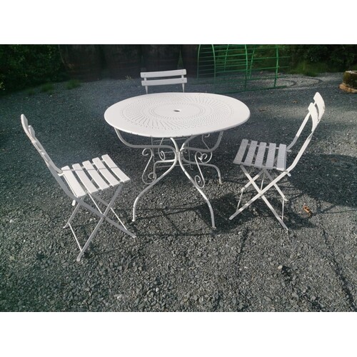 Early 20th C. wrought iron garden table and three matching c...