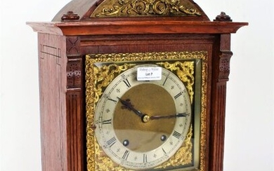 Early 20th Century oak bracket clock, Camerer Kuss & Co New Oxford St, the arched top with gilt