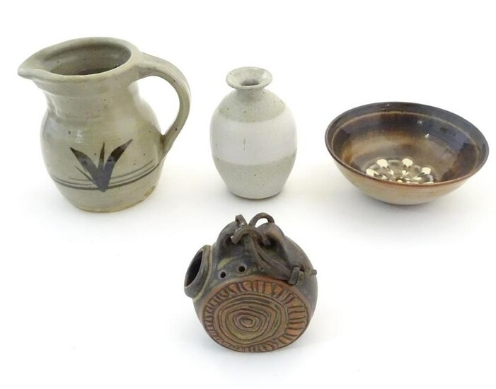 Four assorted studio pottery wares comprising a flask