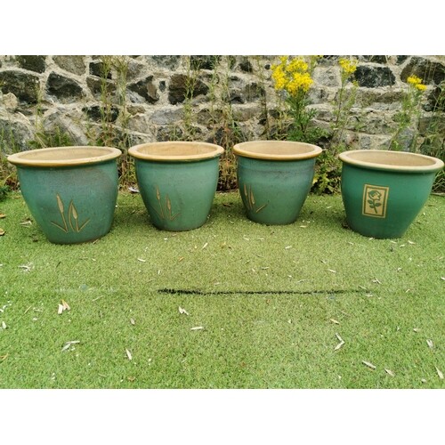 Four glazed terracotta planters {32 cm H x 38 cm Dia.}
