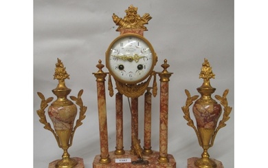 French rouge marble and ormolu mounted three piece clock gar...