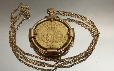 Gold pendant presenting a double louis of gold,...