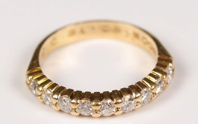 Half wedding band in yellow gold (750) adorned with 9 diamonds (for about 0.45 ct). T: 49, Gross weight: 2.85 gr.