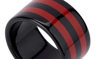 Large lacquered bracelet with red/black stripes. Very good condition