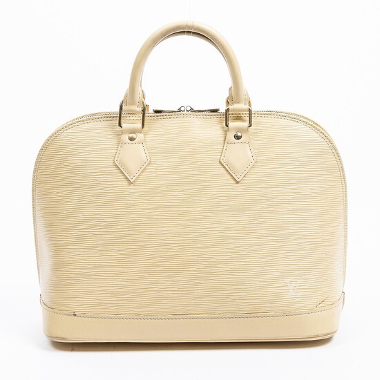SOLD. Louis Vuitton: "Alma" A bag of light yellow Epi leather with gold tone hardware and two handles. – Bruun Rasmussen Auctioneers of Fine Art