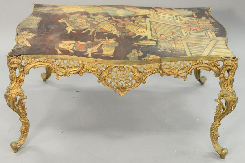 Louis XV style brass table, having Chinese panel top.