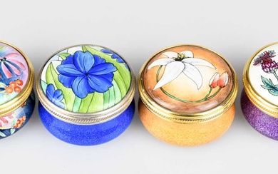 MOORCROFT; four enamel pill boxes and covers of circular form,...