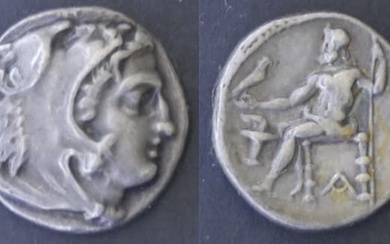 Macédoine – Alexandre III (336-223 avant J.C) Drachme A : Tête d’Héraclès à droite coiffée...