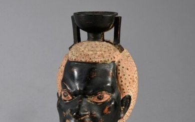 Nubian head vase, terracotta with polychrome decoration.