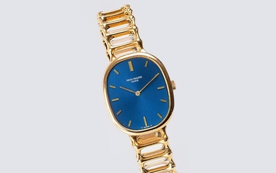 Patek Philippe: A Gentlemen's Wristwatch 'Golden Ellipse Blue Dial' with Gold Bracelet