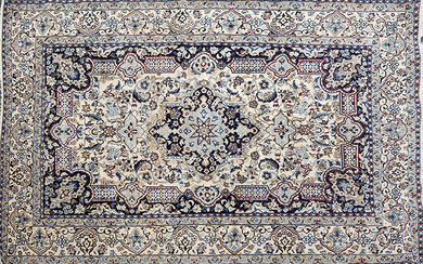 Persian woollen carpet with decoration of vegetable motifs on beige field. Size: 200x310 cm. Exit: 450uros. (74.874 Ptas.)