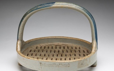 SCARCE DECORATED STONEWARE FOOTED PIE CARRIER WITH HANDLE.