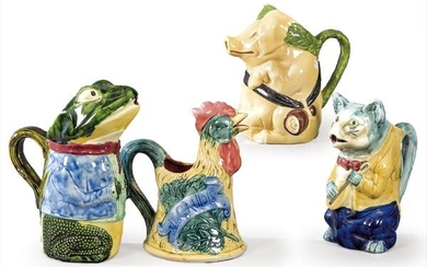 Set of four enamelled ceramic animal-shaped jugs.