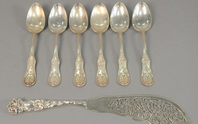 Six Tiffany & Co. tablespoons, along with large