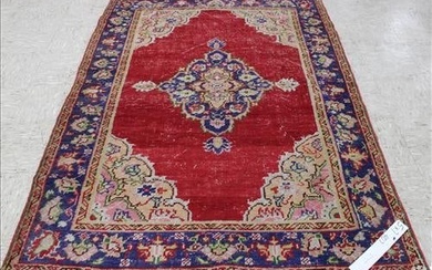 Small handmade Persian rug with some wear, 5 x 7