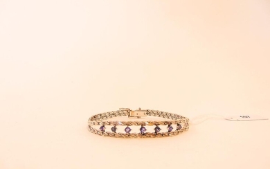Soft bracelet in 18 carat white gold set with sapphires, hallmarks, l. 18.5 cm, approx. 17 g.